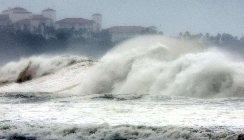 Waves brought by Typhoon Hinnamnor slam into the coast on South Korea's resort island of Jeju