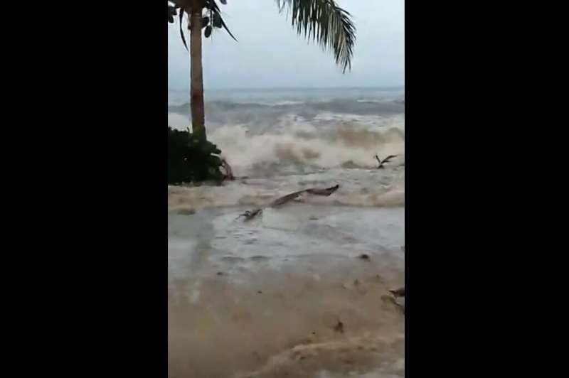 Waves hit the coast of Suva City in Fiji following the volcanic eruption in Tonga