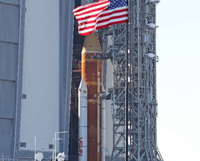 With the Orion crew capsule fixed on top, the Space Launch System (SLS) Block 1 stands 322 feet (98 meters) high—taller than the
