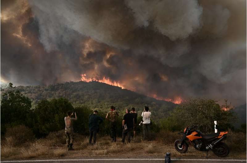 A dangerous blaze raged for a second day on Mount Parnitha near Athens