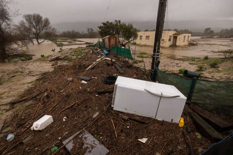A refrigerator lay among debris deposited by flooding of the Salinas River in central California on January 14, 2023
