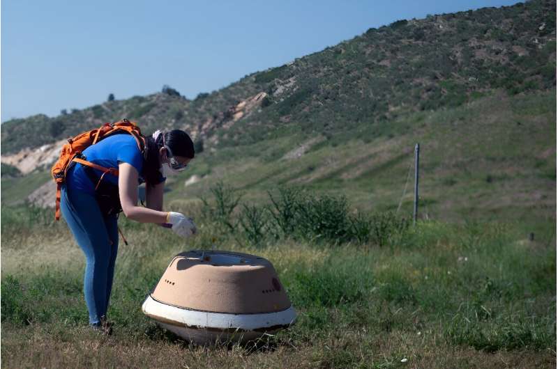 A replica of the Osiris-Rex capsule is seen on June 27, 2023 in Littleton, Colorado; the historic NASA mission is set to return a first asteroid sample to Earth