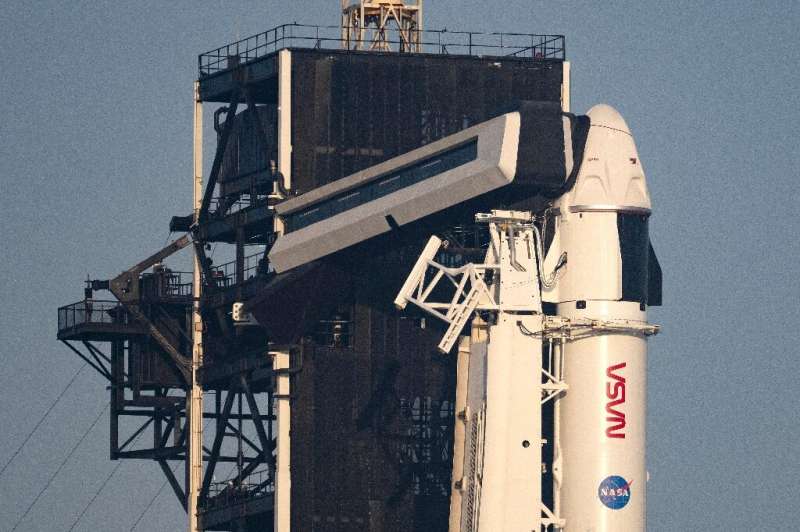 A SpaceX Falcon 9 rocket that is to fly Dragon Crew-6 to the International Space Station on the launch pad at the Kennedy Space 