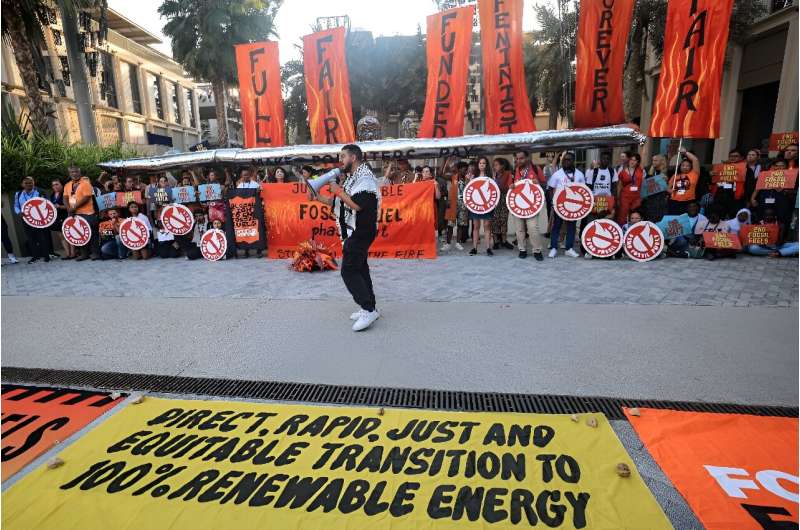 Activists protest against fossil fuels on the sidelines of the COP28 United Nations climate summit in Dubai on December 5