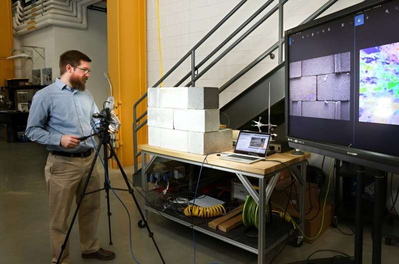 Air leak detection system visualizes building drafts with the click of a camera
