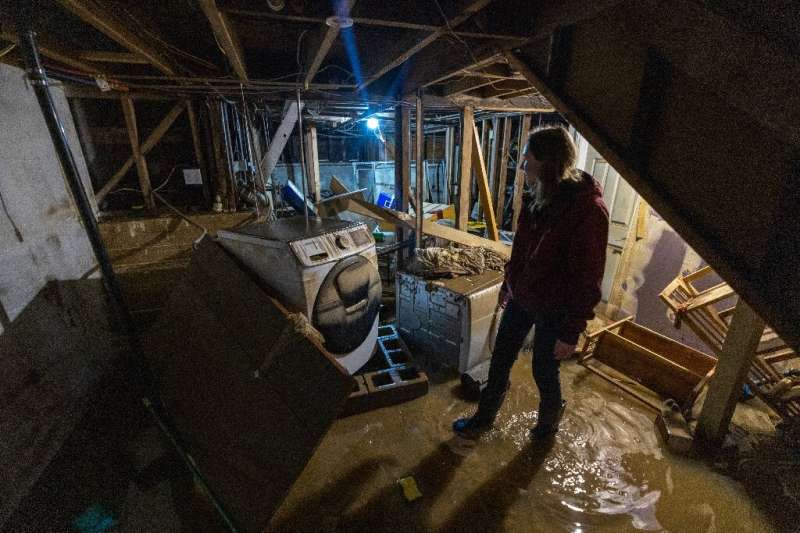 Amberlee Galvin stands in her flooded basement in Felton, California, on January 14, 2023