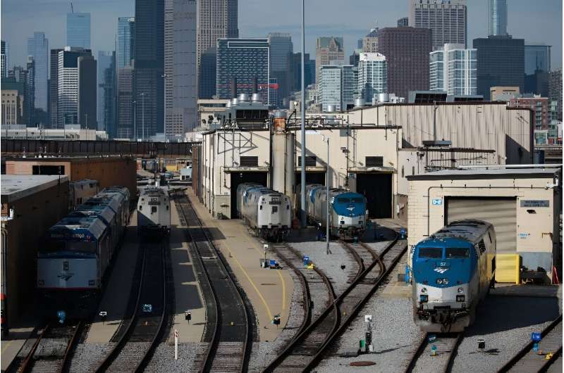 Amtrak passenger railroad locomotives sit in a rail yard at Union Station in Chicago, a city with a long American history of train service