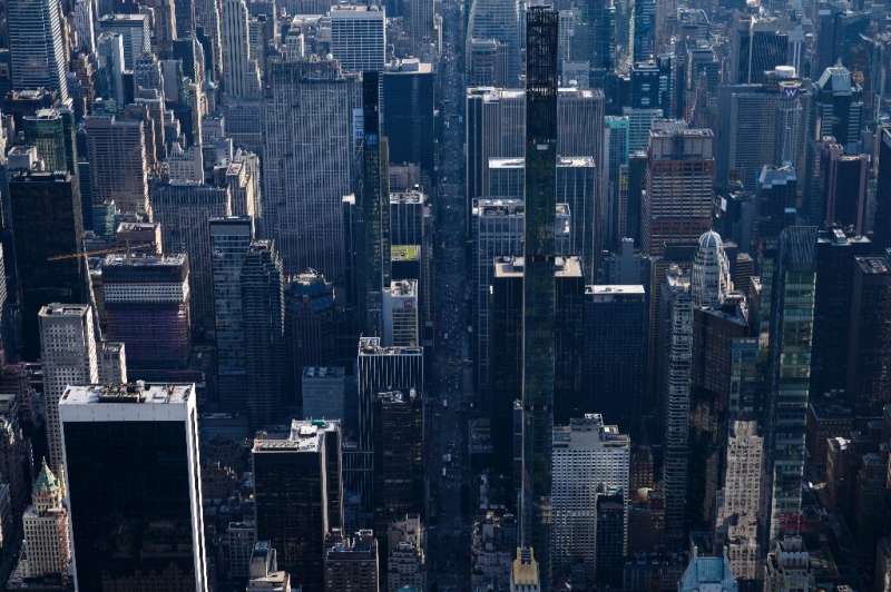 An aerial general view shows the skyline of Midtown Manhattan, New York City on August 5, 2021
