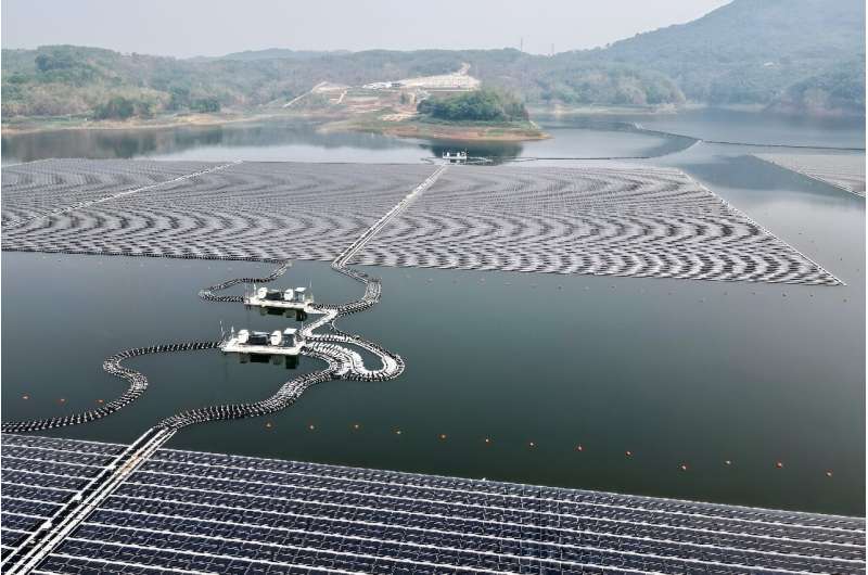 An aerial picture of a new floating solar power plant built in West Java by Indonesia and UAE renewable energy firm Masdar and inaugurated by President Joko Widodo