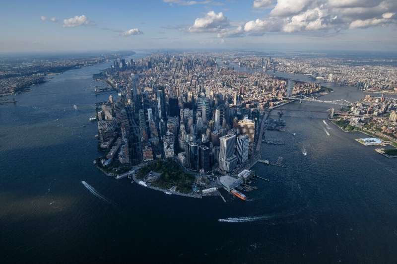 An aerial view shows the skyline of lower Manhattan, New York city on August 5, 2021