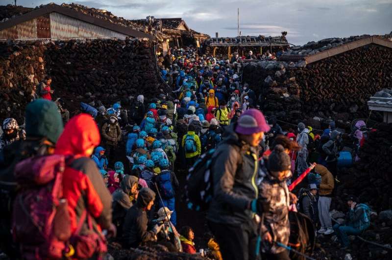 An 'unprecedented' number of people are expected to try and climb Mount Fuji this year