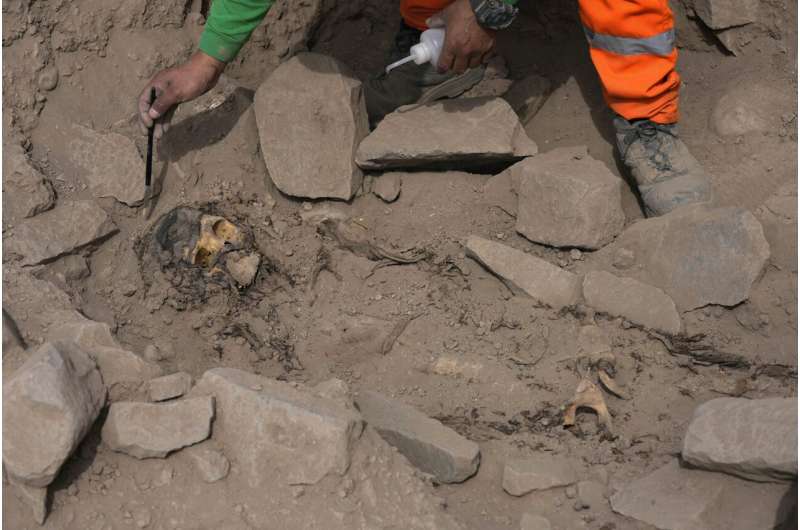 Archaeologists find mummy surrounded by coca leaves on hilltop in Peru's capital