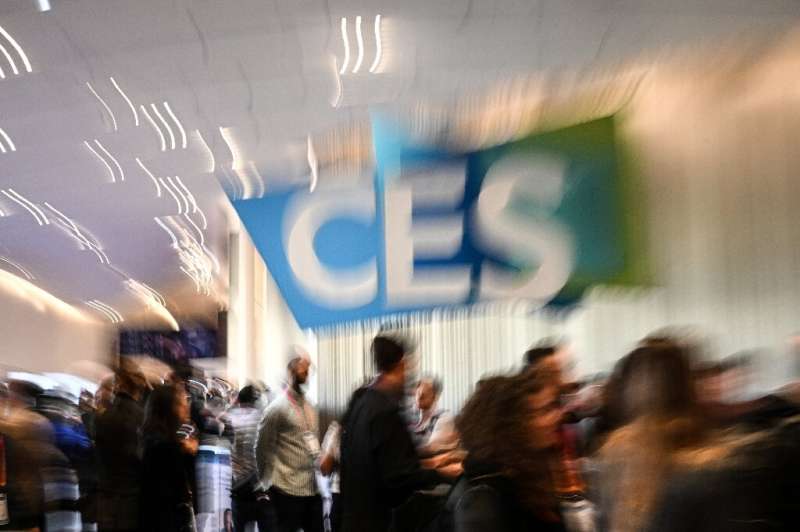 Attendees walk through the Consumer Electronics Show (CES) in Las Vegas, Nevada