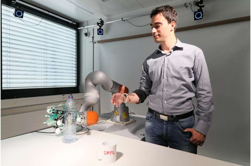 Augmenting the human body with a wearable robotic arm