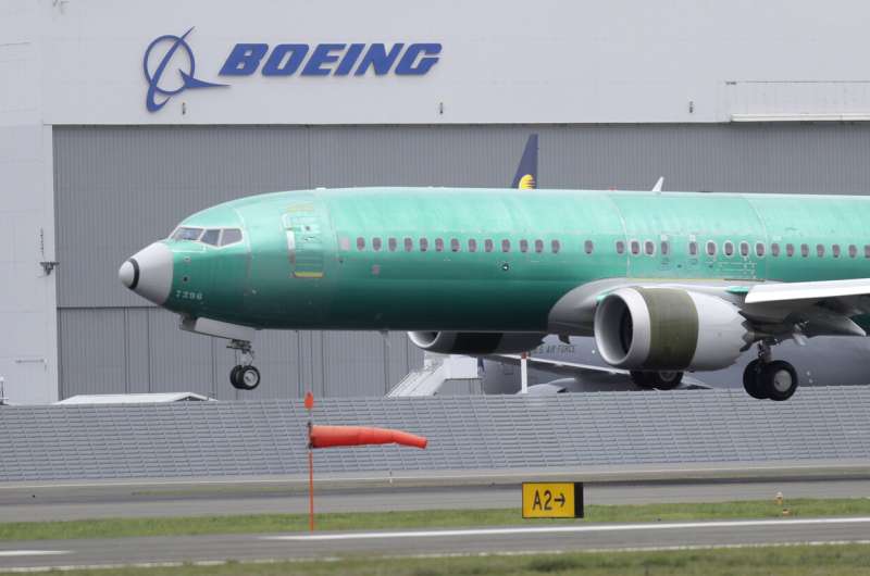 Boeing says deliveries of new planes are up, generating much-needed cash for the aircraft maker