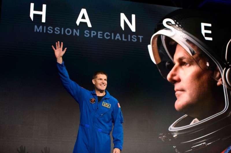 Canadian astronaut Jeremy Hansen waves after being named to the Artemis II mission