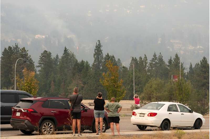 Canadian officials described the wildfire situation in the scenic Okanagan Valley as 'highly dynamic'