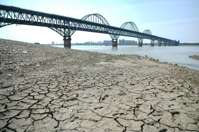 Commercial traffic along rivers in Europe and China -- as in this photo of the Yangtze River -- were disrupted by drought in 202