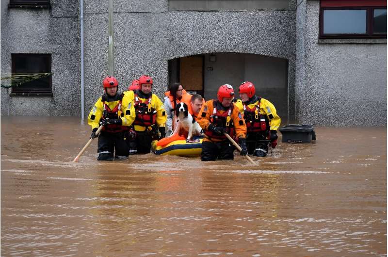 Emergency services in Brechin, Scotland, trying to reach trapped residents were hampered by strong currents and flooding