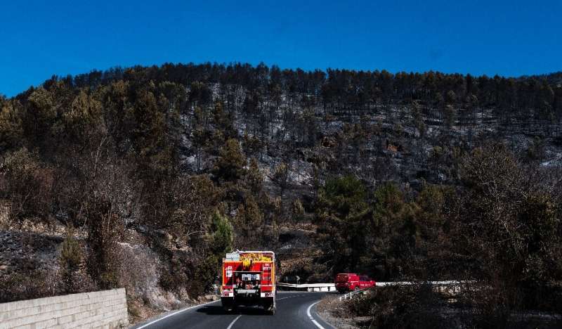 Emergency vehicles head to join efforts to put out a blaze believed caused deliberately