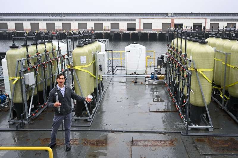 Engineers built a floating mini-factory on a 100-foot (30-meter) long boat which pumps in seawater and subjects it to an electri