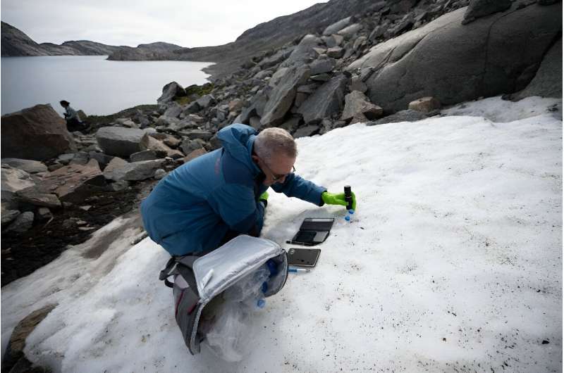 Eric Marechal of France's CNRS research centre studying algae layers near the glaciers around Milne Land in Scoresby Fjord