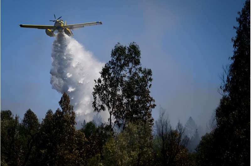 Firefighters are using water bombers to battle fierce blazes in Portugal