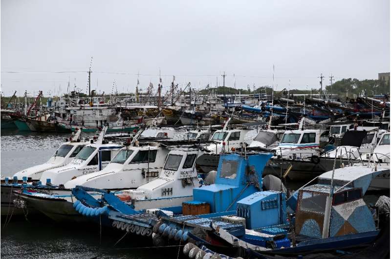 Fishing boats are anchored at a port in Yilan as Typhoon Haikui makes its way to eastern Taiwan