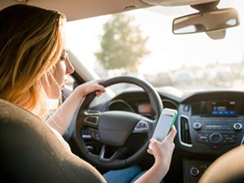 Half of U.S. drivers say they often use cellphones behind the wheel