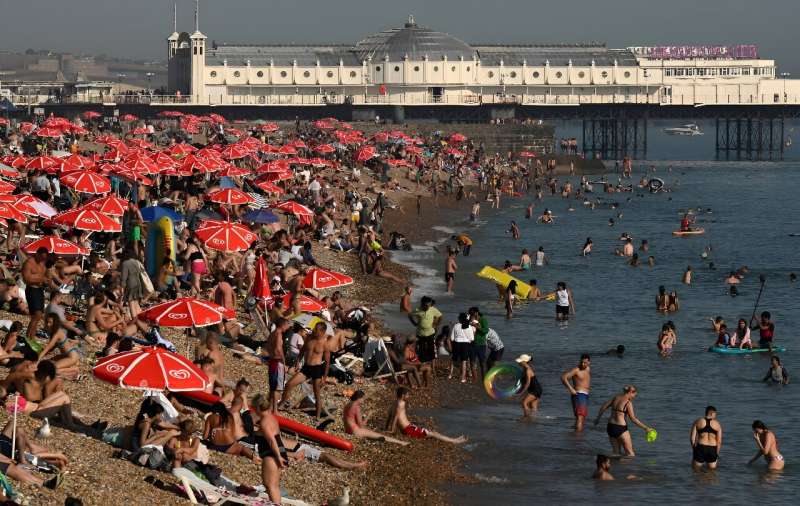 High September temperatures have seen Britons flock to beaches such as Brighton in southern England