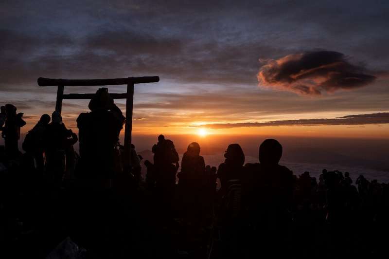 Hundreds of thousands of climbers often trek through the night to see the sunrise each year