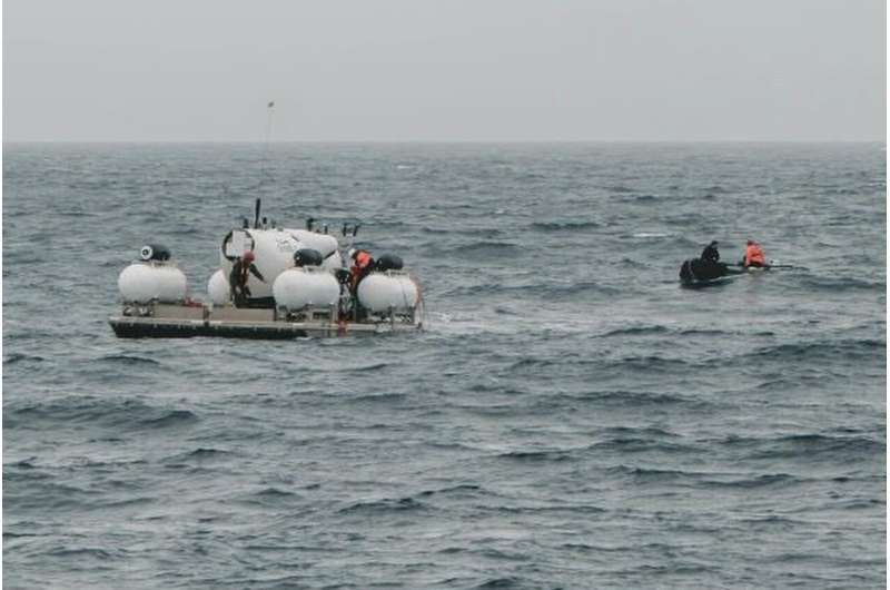 In race against clock, expanding fleet of ships searches for submersible lost near Titanic wreck