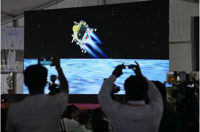 India lands near the moon's south pole, a first for the world as it joins elite lunar club