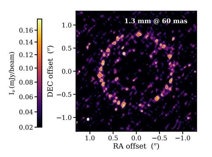 Large double-ring disk detected around the star 2MASS J04124068+2438157