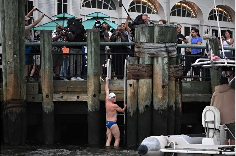 Lewis Pugh arrives at the finish of his 315-mile Hudson river swim in New York