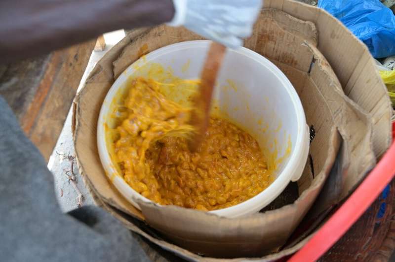 Maad pulp being blended into a compote. Senegalese eat the delicacy with salt, sugar or chilli and sometimes consume it as jam o