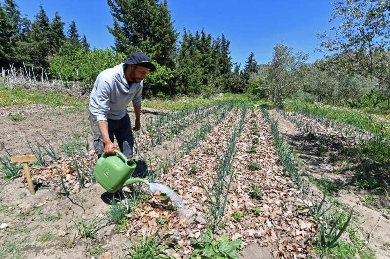 Many, like farmer Saber Zouani,  hope permaculture will help Tunisia weather the impacts of climate change and ween it off its r