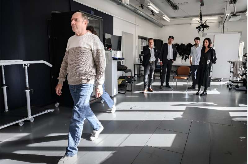 Marc, who has advanced Parkinson's disease, walks with help from electrodes implanted in his spine at Lausanne University Hospital in Switzerland