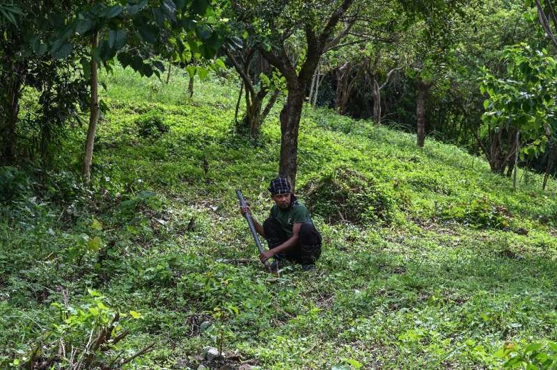 Masungi forester, Kuhkan Maas, has been abused and even shot for trying to protect the land where he has planted thousands of trees