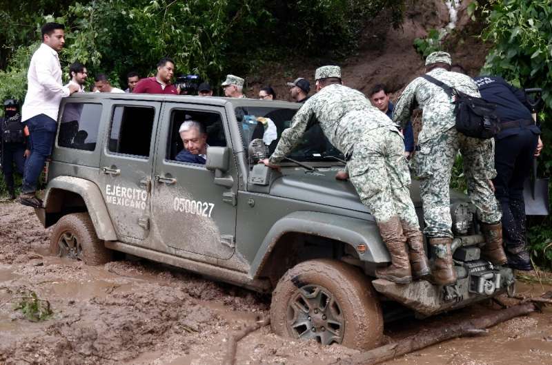 Mexican President Andres Manuel Lopez Obrador got stuck in the mud while trying to visit hurricane-affected residents of Acapulco