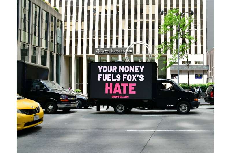 Mobile billboards circle Fox headquarters in May 2023 with a message aimed at advertisers not to fund Fox News