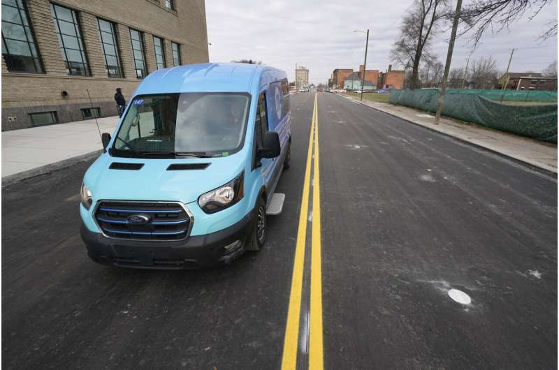 New technology installed beneath Detroit street can charge electric vehicles as they drive