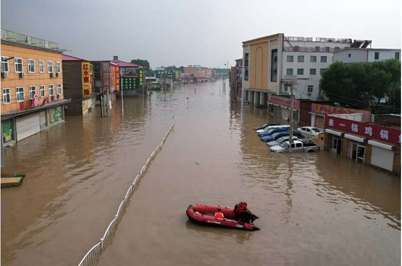 Normally bustling main streets in Hubei province turned to rivers