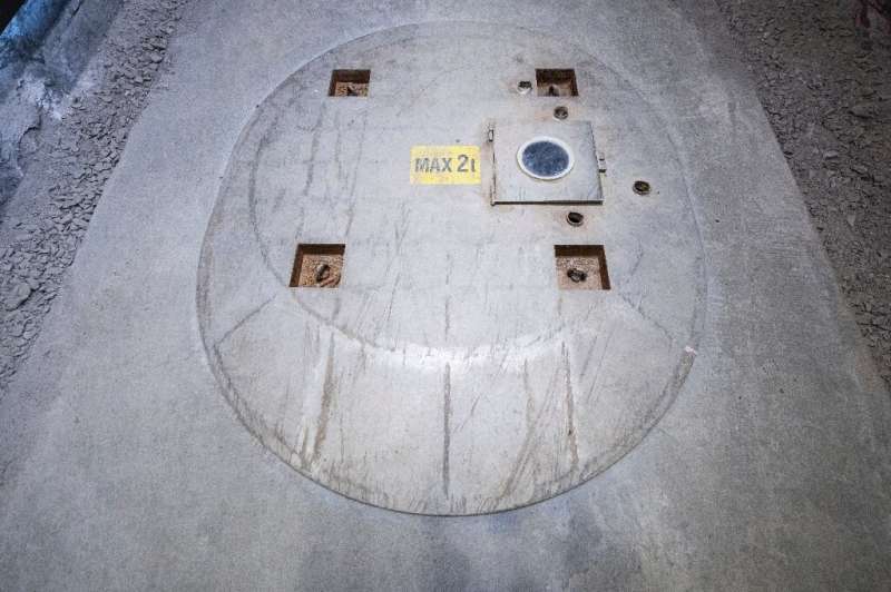 Nuclear waste is stored in holes covered by lids such as these