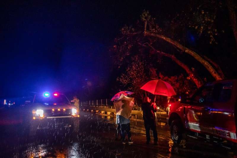 Overflowing rivers have forced the closure of roads in and around Montecito, a California town where authorities have warned of 