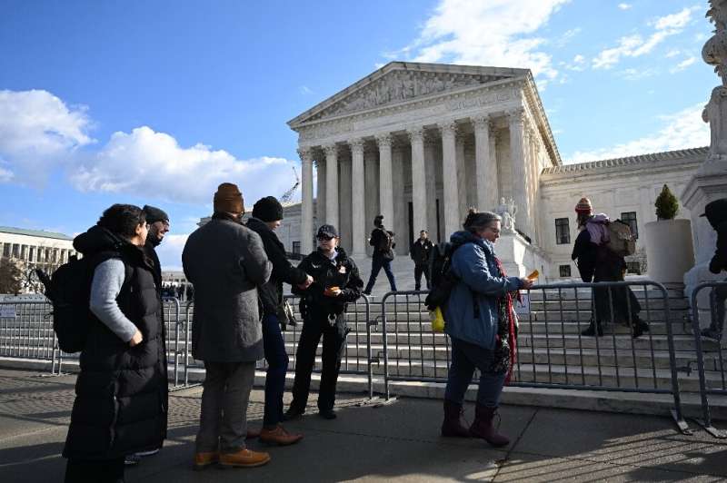 People line up outside the US Supreme Court in hopes of getting a seat in the public gallery for the Big Tech - Section 230 case