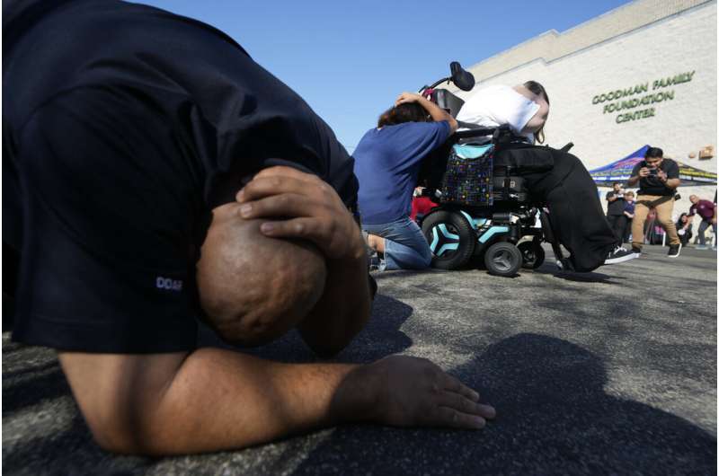 Residents of earthquake zones 'drop, cover and hold on' during annual ShakeOut quake drill