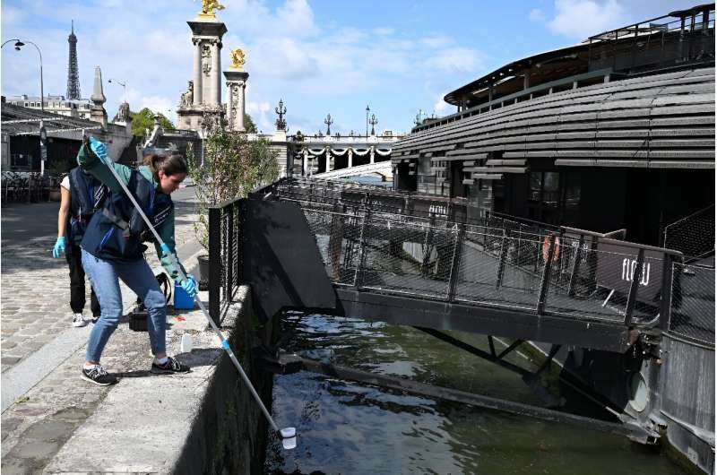 Samples are collected from the Seine ahead of test events for the 2024 Paris Olympics, near the Pont Alexandre III in Paris