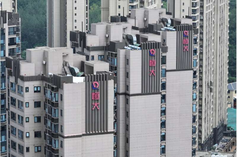 Shares in troubled Chinese property giant Evergrande in Hong Kong plummeted more than 80 percent on Monday after it resumed trad