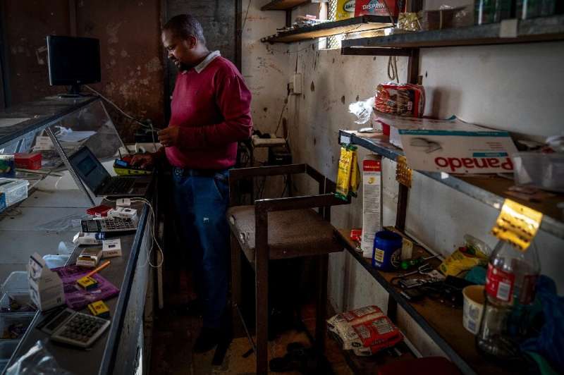 Shopkeeper Thando Keswa said he had had to shut down his takeaway business as he could no longer afford to use a generator to pr